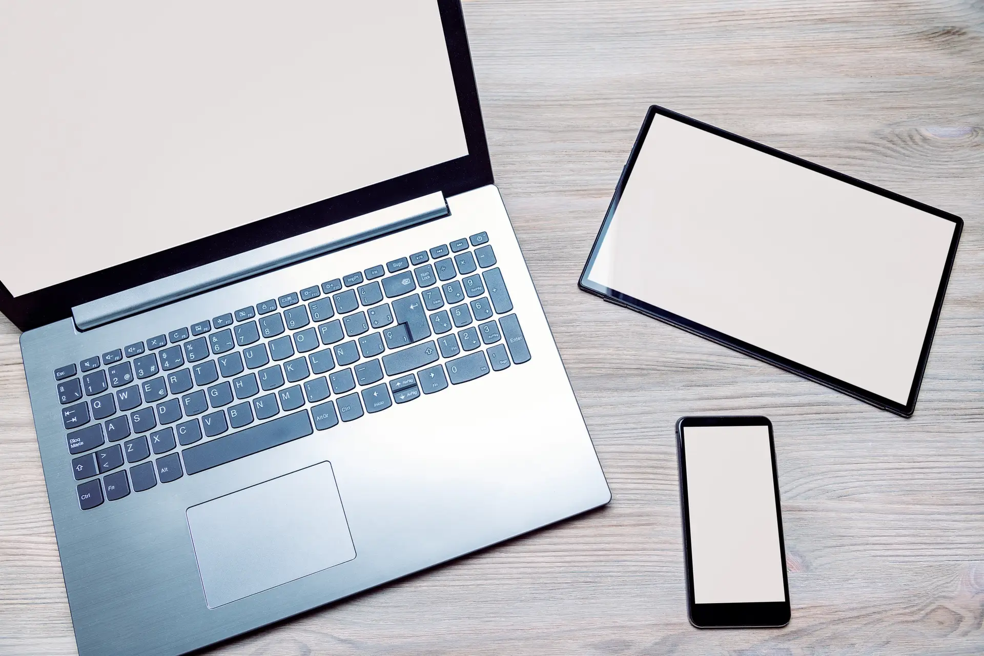 laptop, tablet and phone with blank screen
